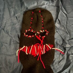 Handmade Black Knit Mask with Red and White Stitching